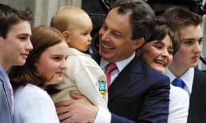 Tony Blair with Leo on the steps of No 10 with, left to right, Nicholas, Kathryn, Cherie and Euan.