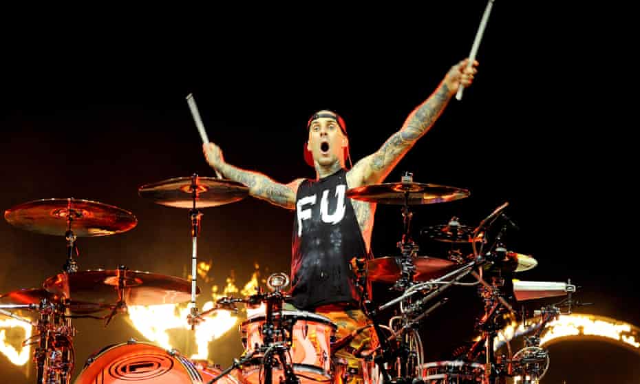 Inspired drumming lunacy … Travis Barker of Blink 182 performs amid jets of fire at the Echo Arena, Liverpool.