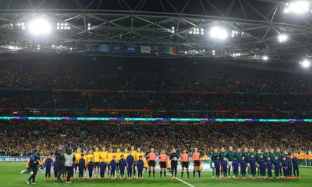 Teams line up on pitch before the match