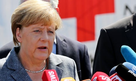 The German chancellor Angela Merkel visits a refugee shelter in Heidenau.