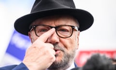 George Galloway pushes his glasses up his nose