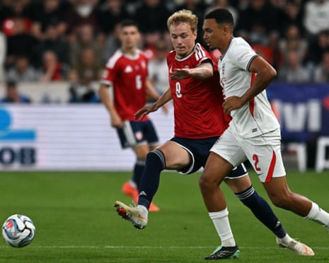 Adam Karabec (left) battles for the ball with Trent Alexander-Arnold during CzechiaâÂÂs Nations League match against England.