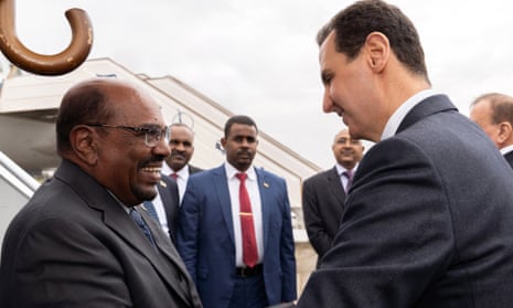 Sudan’s president, Omar al-Bashir, shaking hands with Bashar al-Assad