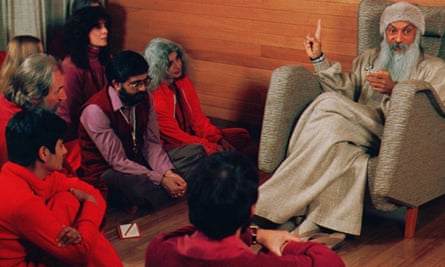 Bhagwan Shree Rajneesh speaks to his disciples at the Rajneeshpuram commune in Oregon.