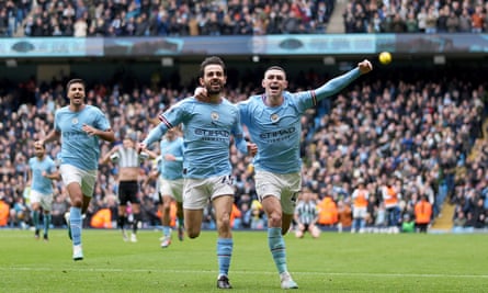 Goalscorers Bernardo Silva and Phil Foden celebrate Manchester City’s 2-0 lead