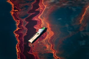 Daniel Beltrá, Oil Spill #12. An aerial view of the oil leaked from the Deepwater Horizon wellhead. The BP-leased oil platform exploded April 20 and sank after burning, leaking more than about 200,000 gallons of crude oil to the sea per day from the broken pipeline .