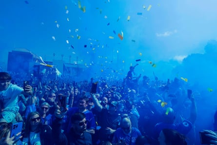 Everton fans gather outside the ground to welcome their team coach before the Premier League match against Southampton, the final ever men’s match to be played at Goodison Park.