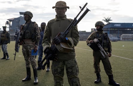 M23 rebels stand guard at a stadium in Goma, North Kivu, DRC.