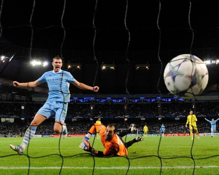 Edin Dzeko celebrates an own goal from Carlos Marchena in Villarreal’s Champions League defeat at the Etihad in 2011.