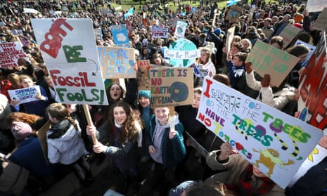 Pupils taking part in a global climate strike outside the Scottish parliament in Edinburgh in March.