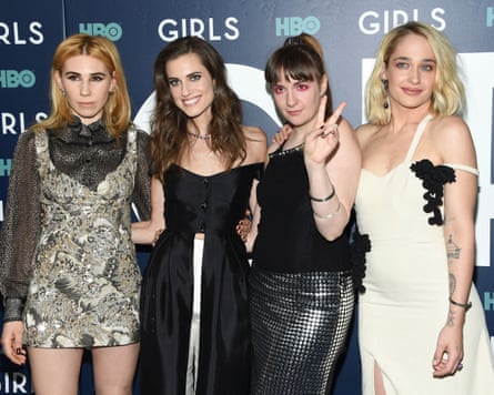 Four girls in front of a Girls HBO backdrop