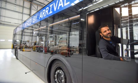 Avinash Rugoobur, president of Arrival, demonstrates one of the company’s protoype electric buses.