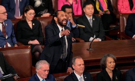 Representative Al Green shouts as Trump addresses Congress.