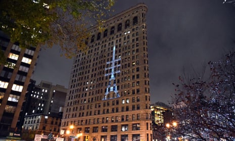 In a show of solidarity with Paris in the wake of the attack, the Flatiron Building, pays tribute to the Eiffel Tower, with a 40 X 100-foot projection of the Eiffel Tower in New York on November 18, 2015. The projected image will feature a banner with the motto of Paris Elle est agitée par les vagues, et ne somber pas which means She is tossed by the waves but does not sink. The projection was created as a collaboration between the Sorgente Group of America and Quantum Electric. AFP PHOTO/ TIMOTHY A. CLARYTIMOTHY A. CLARY/AFP/Getty Images
