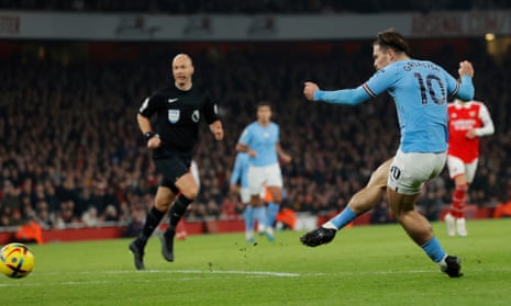 Jack Grealish scores to put Manchester City 2-1 ahead during the F.A. Premier League match between Arsenal and Manchester City.
