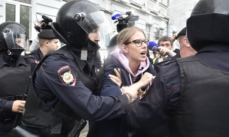 Police officers detain would-be opposition candidate Lyubov Sobol in central Moscow