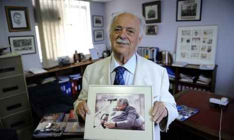 George Bizos in 2010 with a photo of Nelson Mandela. “I was shocked his closing words, that he was ready to die ... surely Nelson wanted to live and accomplish what he and his organisation strove for.”