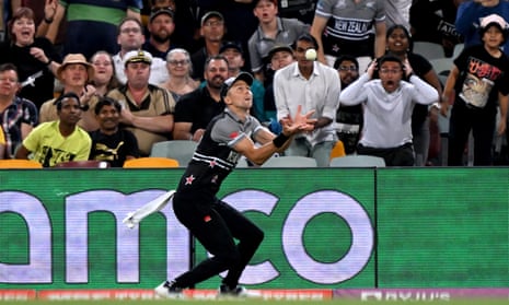 Trent Boult of New Zealand takes the catch to dimiss Moeen Ali of England.