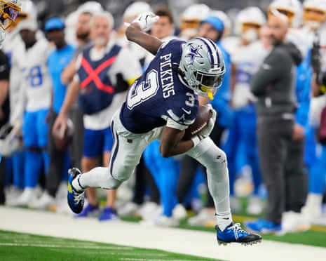 Dallas Cowboys wide receiver George Pickens makes a catch during the first half against the Chargers