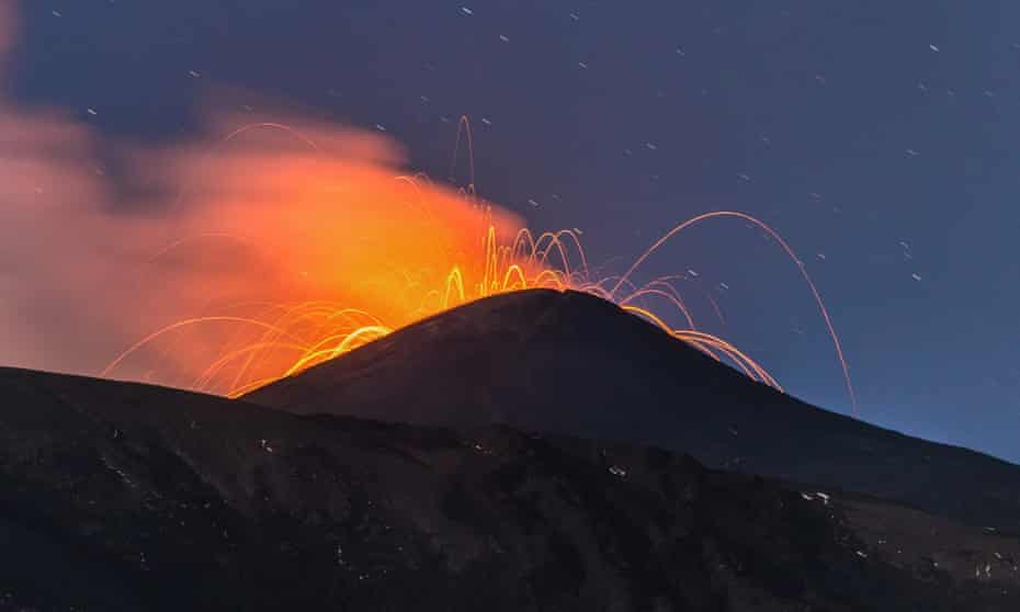 The gorgeous glow … Mount Etna erupts in Catania, Italy on 23 May. 