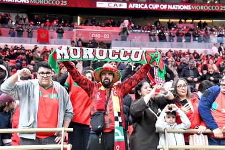 Morocco supporters cheer on their team