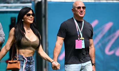 Lauren Sánchez and Jeff Bezos in the paddock ahead of the Miami Grand Prix, 6 May 2023.