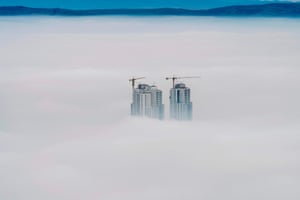 Skopje, Macedonia High-rise buildings break through low clouds over Skopje. The capital has been blighted by poor air quality