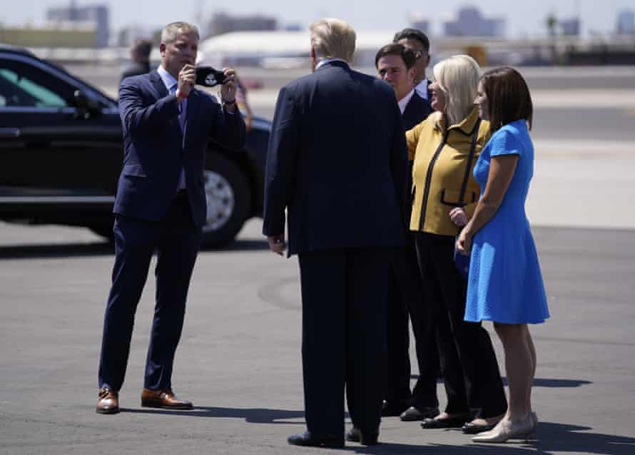 Clint Hickman, vice-chairman of Maricopa county board of supervisors, meets Donald Trump in Phoenix in 2020. Hickman would resist Trump’s attempt to overturn his defeat in Arizona.