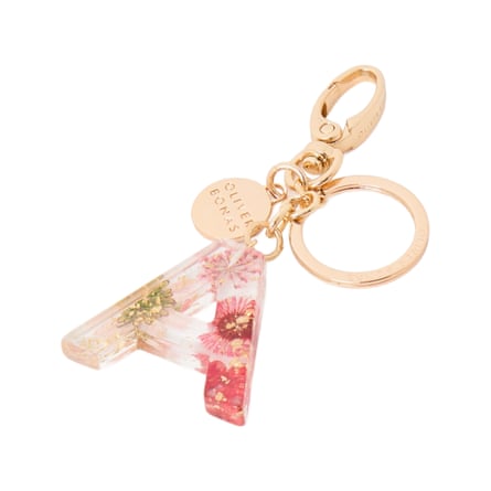 Oliver Bonas Alphabet Pink Flower Resin Initial Keyring. An acrylic A shaped keyring.