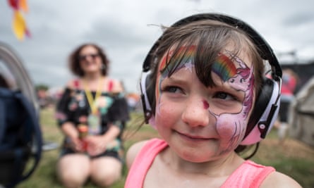 Ellie Woods, 5, watches Charli XCX on The Other Stage with her parents