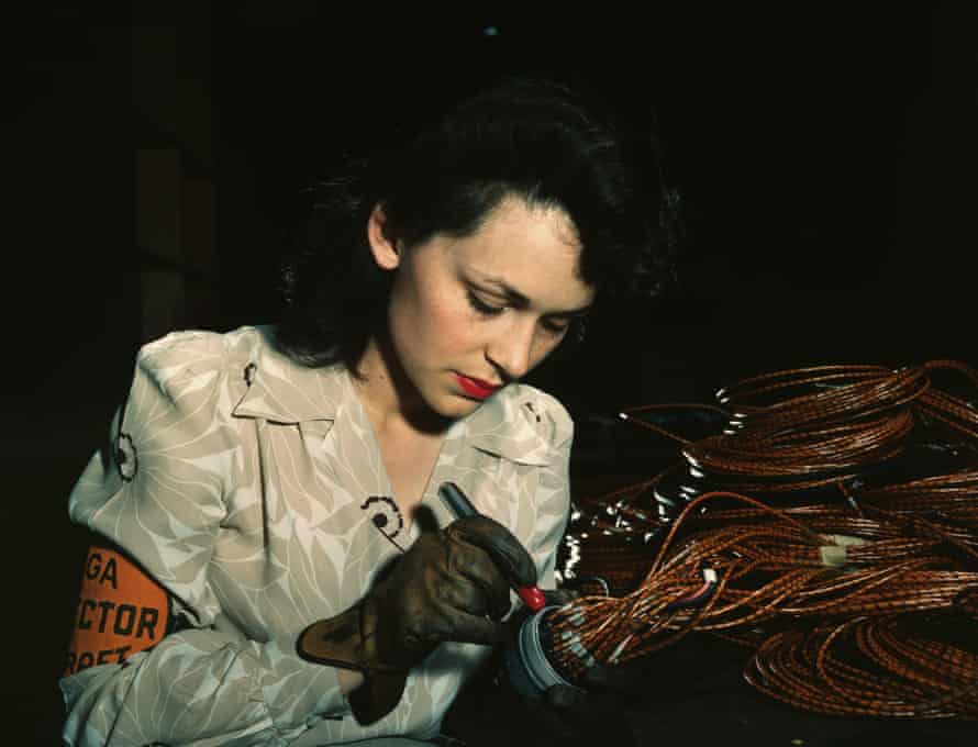 An aircraft mechanic checks electrical assemblies at the Vega Aircraft Corporation, California, 1942.