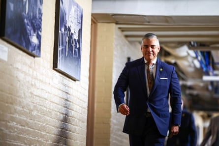 a man walks in a corridor