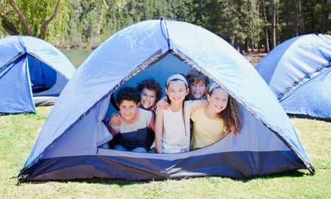 Five children in a tent