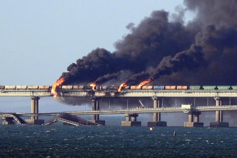 Black smoke billows from a fire on the Kerch bridge on 8 October 2022.
