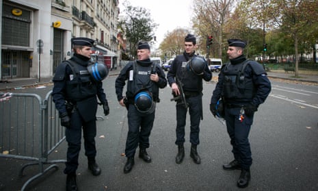 Police officers near the scene of the Bataclan theatre in Paris