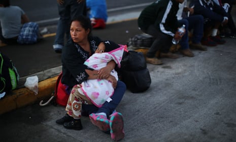 Members of the Central American migrant caravan rest during the trek across Mexico.