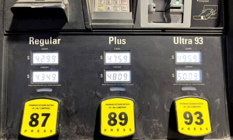 Gasoline prices are seen on a gas pump in Arlington, Virginia, on March 8, 2022. 