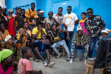 Ivorian supporters react as they watch the Africa Cup of Nations 2024 on a TV