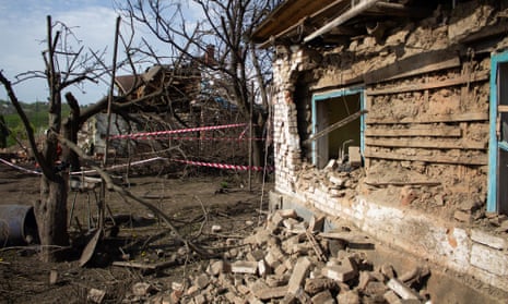 A private residential building stands heavily damaged by a missile fragment explosion on 15 April in Dnipro, Ukraine.
