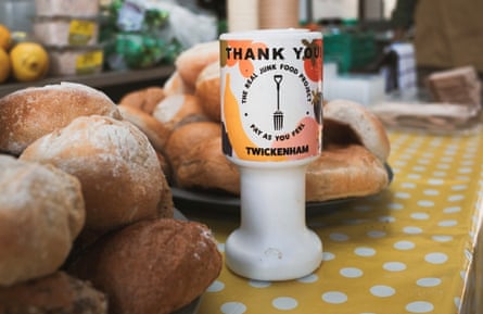 A donation tin on the counter at the ETNA community centre