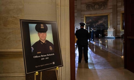 People wait for Brian Sicknick to lie in honor in the Rotunda of the US Capitol in February.