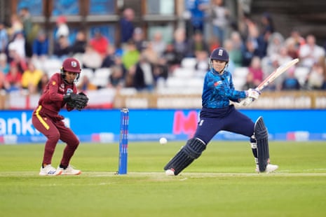 Tammy Beaumont hits to the boundary for four.