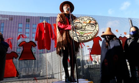 Indigenous people protest in front of the Cop26 venue.