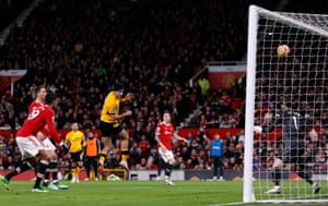 Wolverhampton Wanderers’ Raul Jimenez heads the ball at goal.
