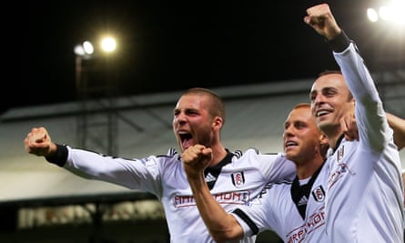 Pajtim Kasami (left) celebrates with Fulham teammates Steve Sidwell and Dimitar Berbatov.