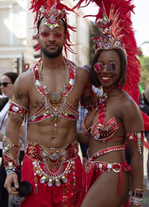 Colourful masquerade dancers at the Notting Hill carnival