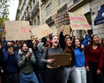 Students holding placards.