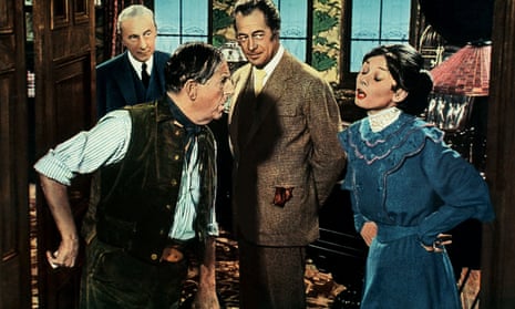 Stanley Holloway, second left, as Alfred Doolittle in My Fair Lady.
