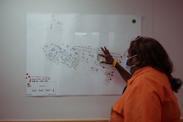 Teresa Matthews points at a map inside the Katherine West Health Centre in Lajamanu