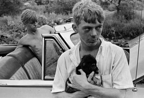 ‘I gave them a dollar to get the car going’ … Boy With Puppy, Knoxville, Tennessee, 1967. 